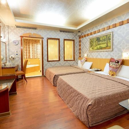 טאינאן Holland Village Motel מראה חיצוני תמונה